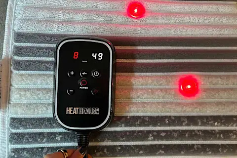   Faça a foto do tapete de curandeiro de calor com controle remoto