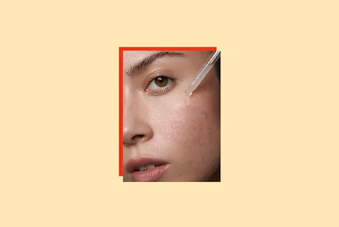   nő fényképe's face using serum dropper on yellow backgorund