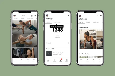 Nike Training Club-grensesnitt på telefoner på bakgrunn